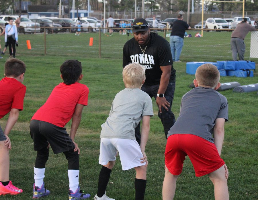 Tenacity coach leading young athletes through sport-specific movement training
